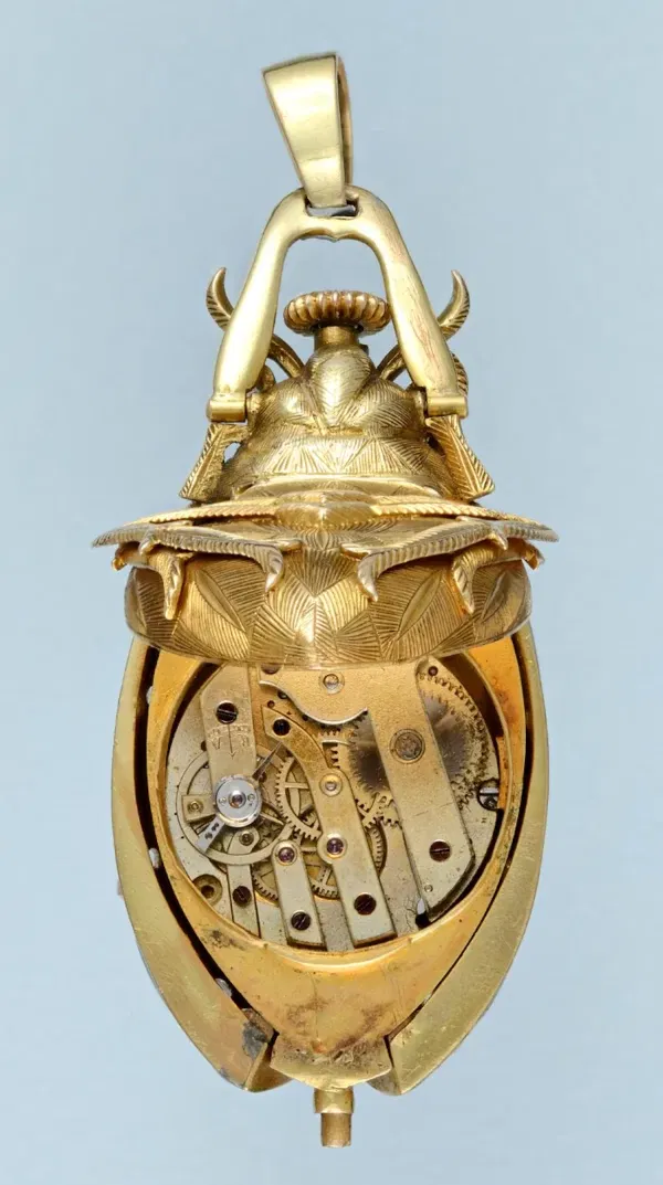 GOLD AND ENAMEL BEETLE FORM WATCH 2 1 scaled